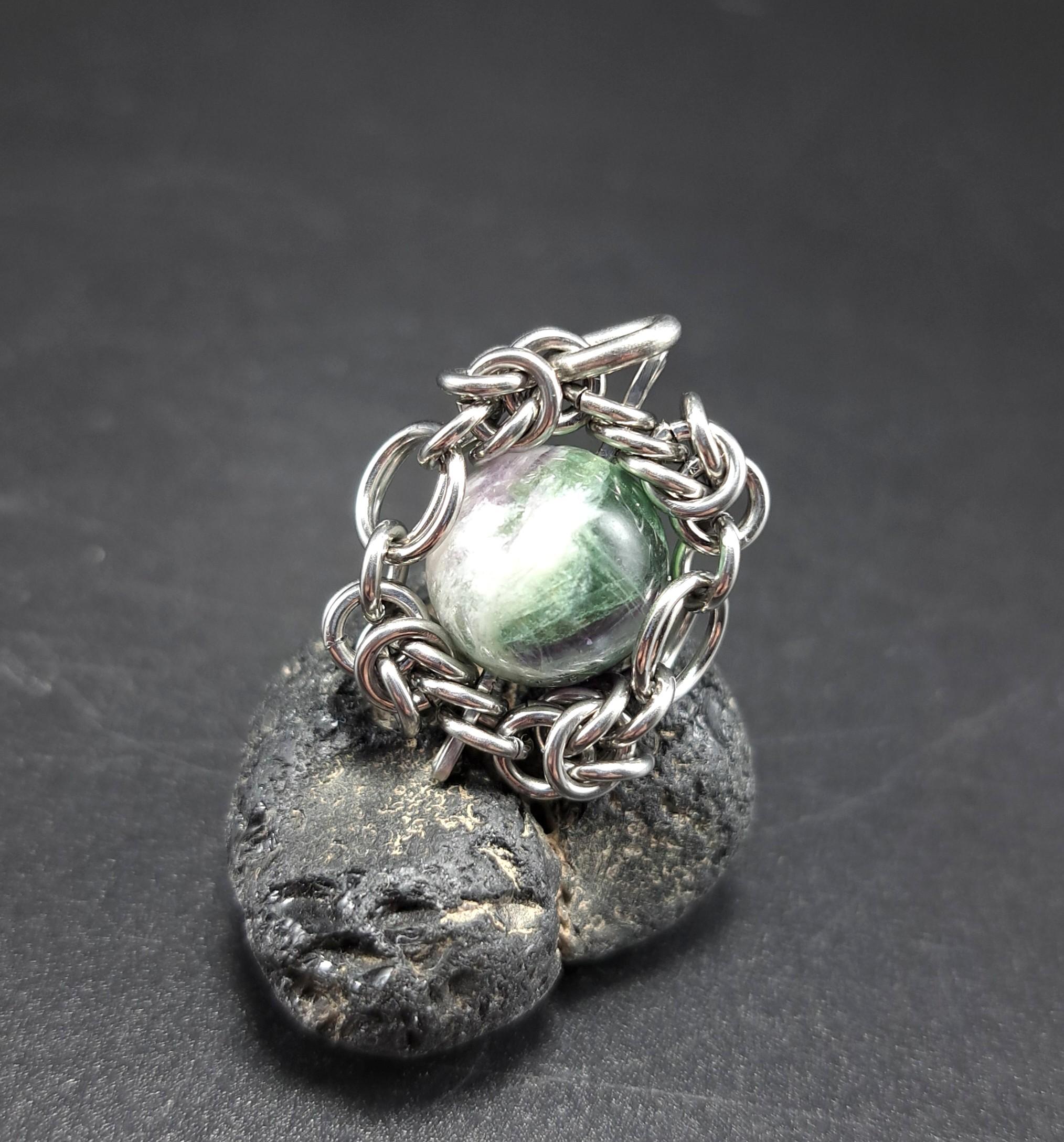 内包物が個性的! フェザー イン フローライト　ペンダントトップ