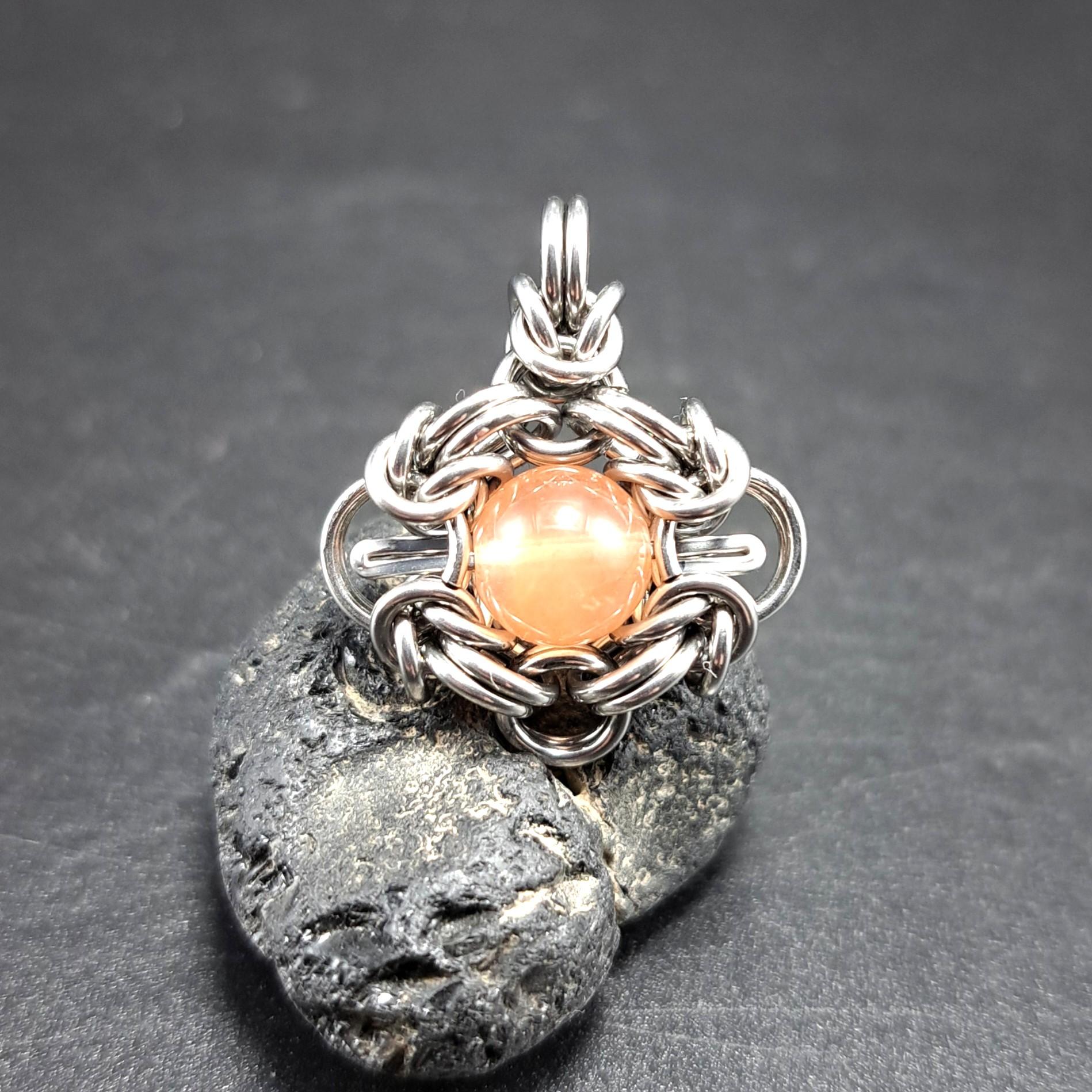 オレンジ ラビットヘアクォーツ　ペンダントトップ1枚目の画像